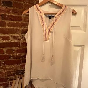 White sleeveless blouse